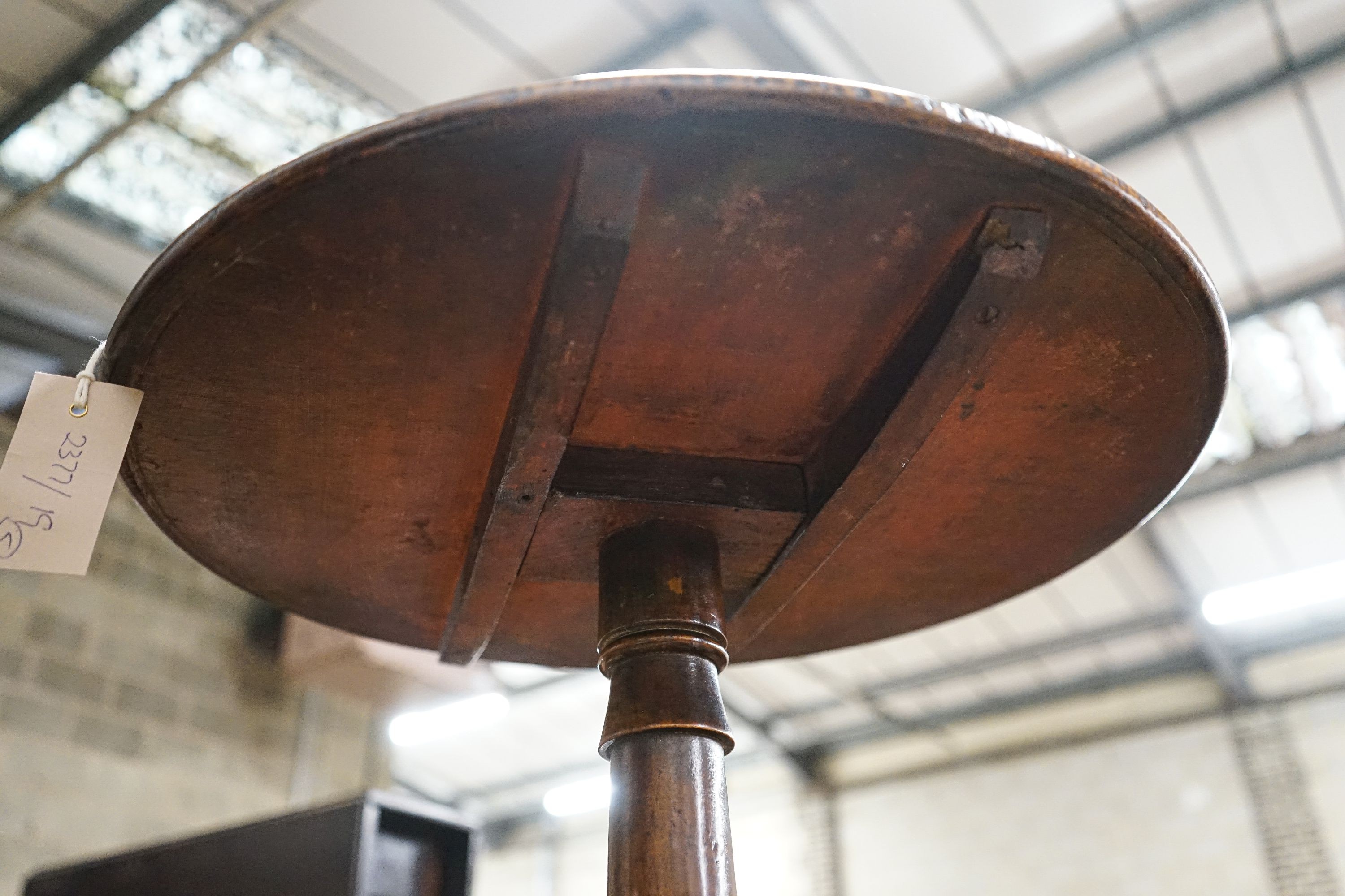 A 19th century circular mahogany tripod wine table, diameter 45cm, height 74cm, together with a nest of tea tables, and a provincial tall oak stool